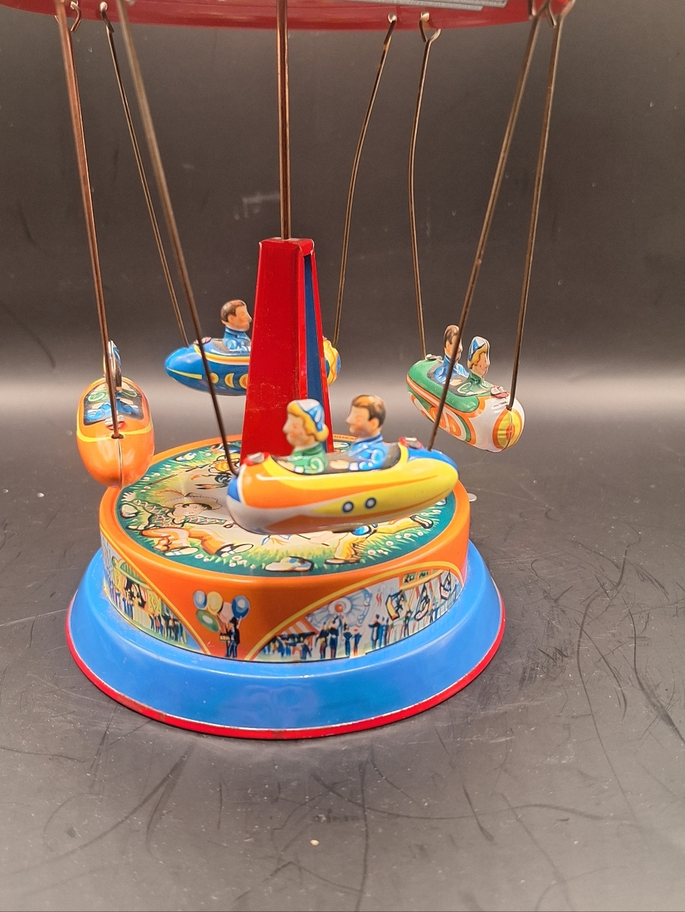 Tin Lithograph Wind Up Carouasel Toy Wild West Rocket Ride Blomer & Schuler (B&S